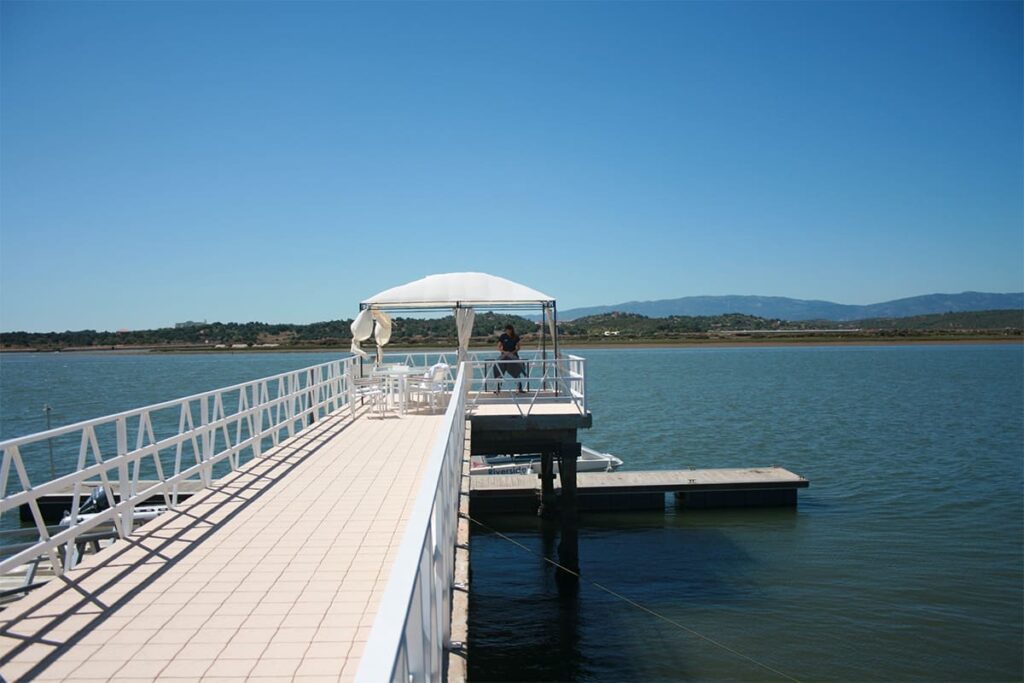 Sitting area at the end of a dock at Agua Hotel and Spa Resort